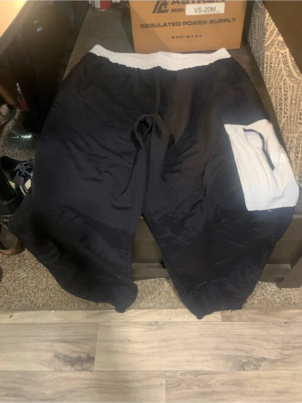 The North Face Black Sweatpants with White Pocket Panel and Green Logo!